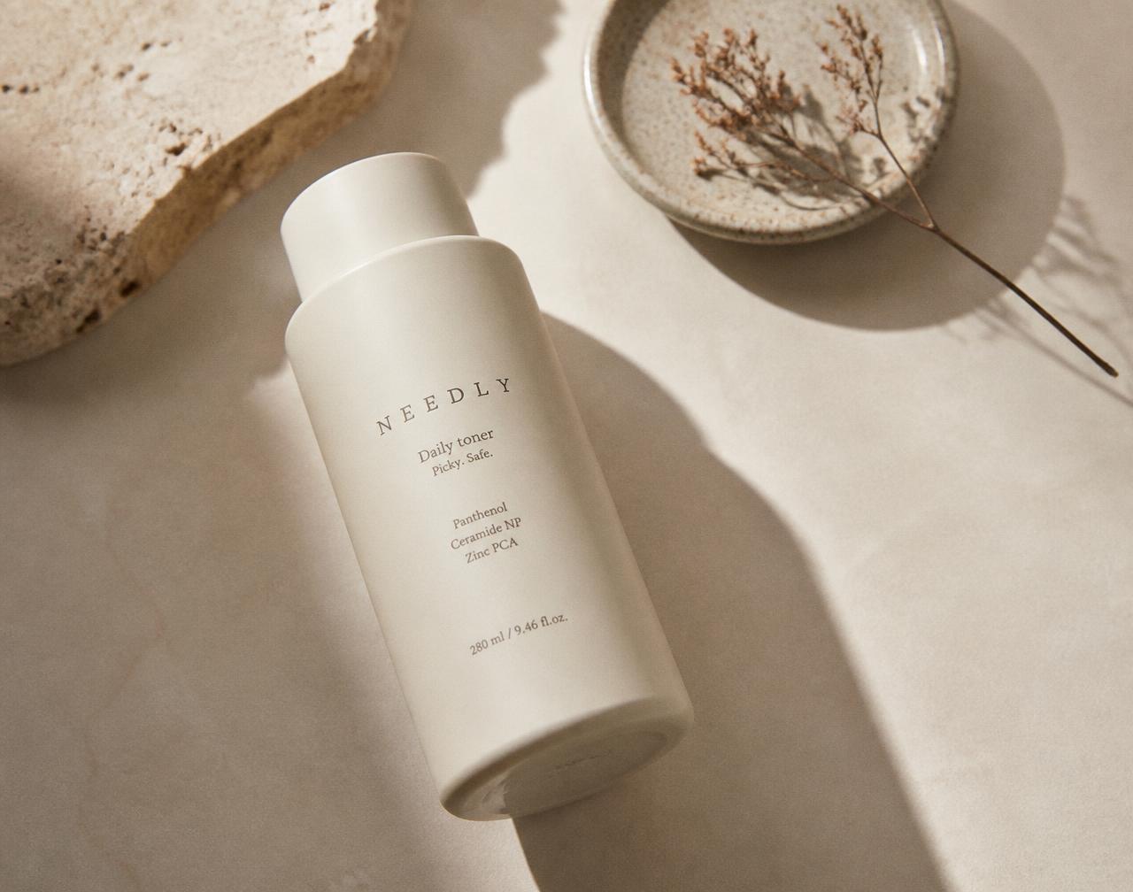 A consumer product held in natural light